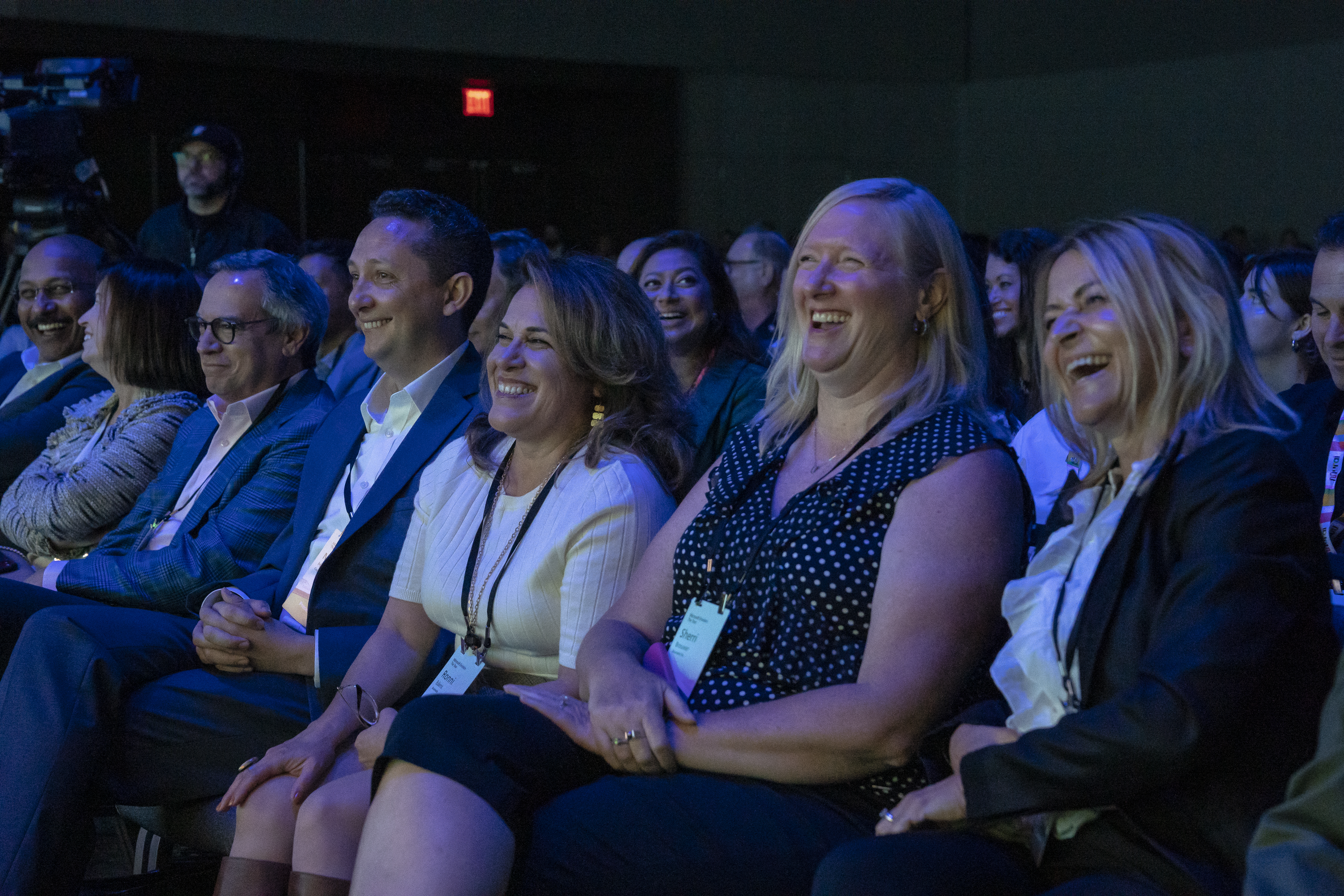 People in audience laughing